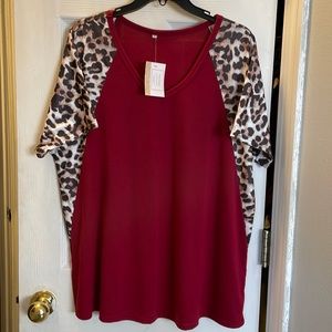 Burgundy top with leopard sleeves